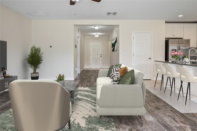 12170 Gothic Rd, Spring Hill, FL 34610 - living area with ceiling fan and baseboards