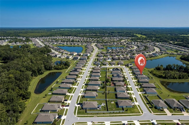 12170 Gothic Rd, Spring Hill, FL 34610 - aerial view of property and surrounding area featuring nearby suburban area and a nearby body of water