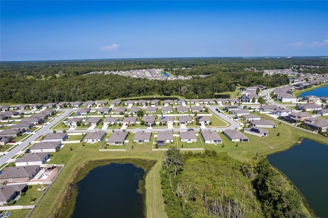 12170 Gothic Rd, Spring Hill, FL 34610 - aerial overview of property's location with a large body of water and nearby suburban area