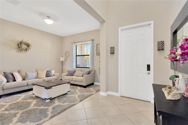 11612 Sunburst Marble Rd, Riverview, FL 33579 - living area featuring light tile patterned floors and baseboards