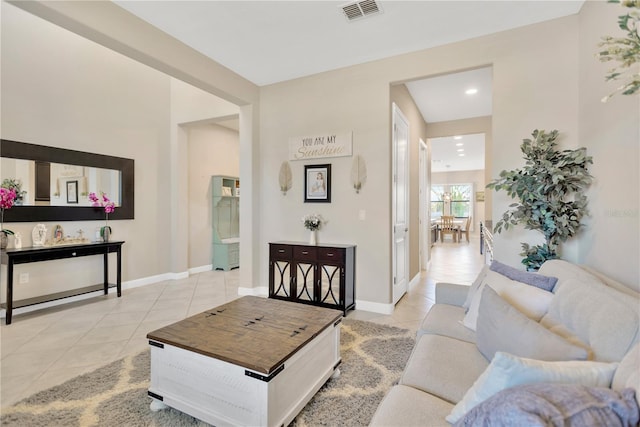 11612 Sunburst Marble Rd, Riverview, FL 33579 - living area featuring light tile patterned flooring, baseboards, and recessed lighting