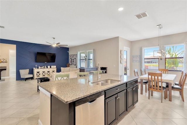 11612 Sunburst Marble Rd, Riverview, FL 33579 - kitchen featuring dishwasher, a sink, ceiling fan, hanging light fixtures, and an island with sink