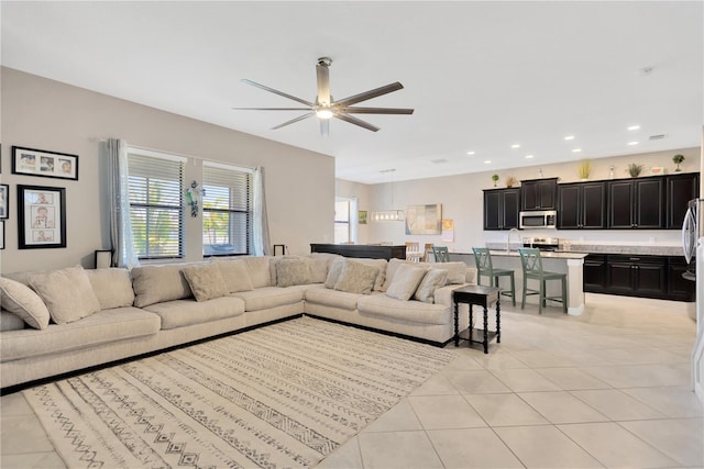 11612 Sunburst Marble Rd, Riverview, FL 33579 - living area with light tile patterned flooring, a ceiling fan, and recessed lighting