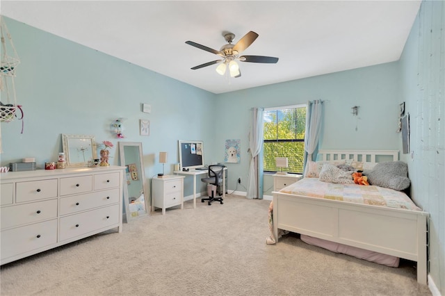 11612 Sunburst Marble Rd, Riverview, FL 33579 - bedroom with light carpet, a ceiling fan, and baseboards