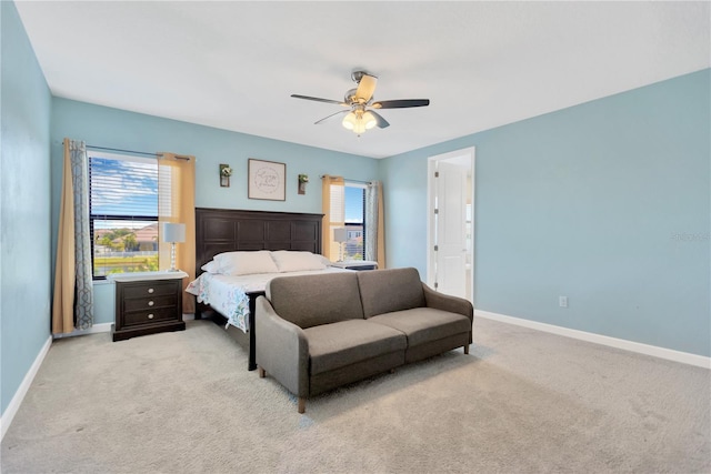 11612 Sunburst Marble Rd, Riverview, FL 33579 - carpeted bedroom with baseboards, multiple windows, and a ceiling fan