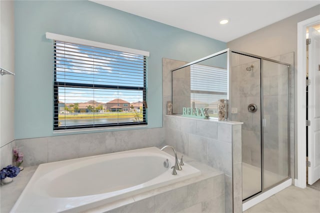 11612 Sunburst Marble Rd, Riverview, FL 33579 - bathroom with a bath and a shower stall