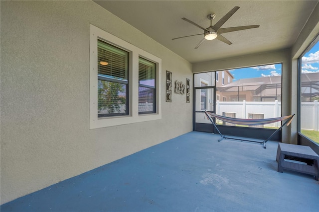 11612 Sunburst Marble Rd, Riverview, FL 33579 - unfurnished sunroom with a ceiling fan