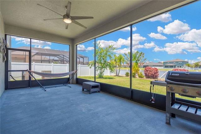 11612 Sunburst Marble Rd, Riverview, FL 33579 - unfurnished sunroom with ceiling fan