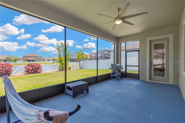 11612 Sunburst Marble Rd, Riverview, FL 33579 - sunroom / solarium featuring ceiling fan and a residential view