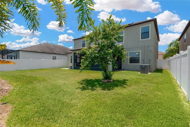 11612 Sunburst Marble Rd, Riverview, FL 33579 - back of house with stucco siding, a sunroom, and cooling unit