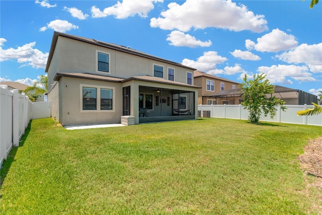 11612 Sunburst Marble Rd, Riverview, FL 33579 - back of house with a sunroom, stucco siding, and ceiling fan