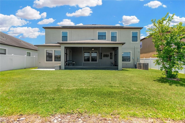 11612 Sunburst Marble Rd, Riverview, FL 33579 - back of house with a sunroom, stucco siding, solar panels, and central air condition unit