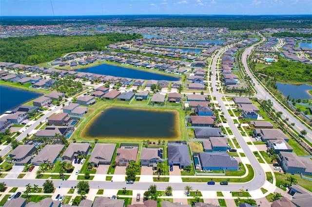 11612 Sunburst Marble Rd, Riverview, FL 33579 - aerial view of property's location featuring nearby suburban area and a large body of water