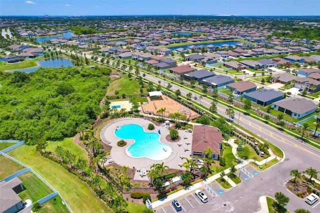 11612 Sunburst Marble Rd, Riverview, FL 33579 - aerial view of property and surrounding area with a large body of water, a pool, and nearby suburban area