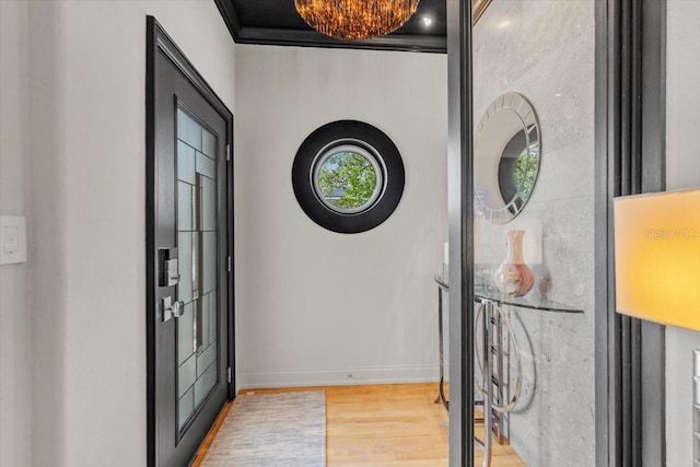 213 N Hesperides St, Tampa, FL 33609 - foyer with wood finished floors and baseboards