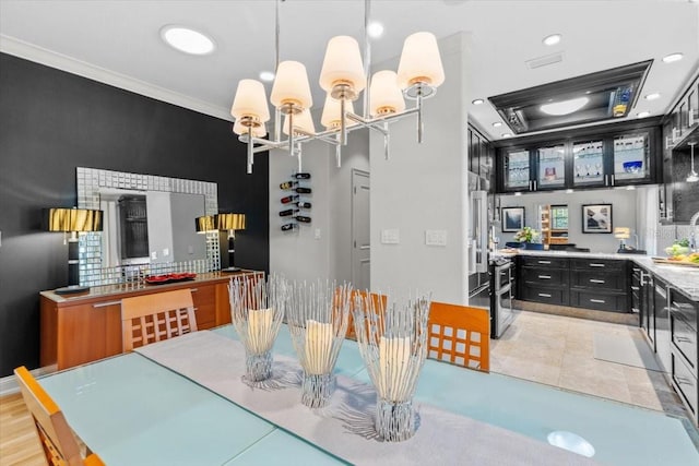 213 N Hesperides St, Tampa, FL 33609 - dining space with ornamental molding, recessed lighting, a chandelier, and baseboards
