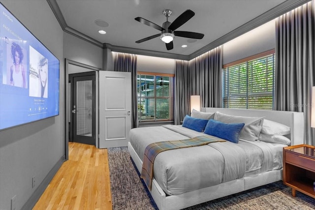 213 N Hesperides St, Tampa, FL 33609 - bedroom with crown molding, wood finished floors, and ceiling fan