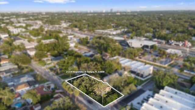 213 N Hesperides St, Tampa, FL 33609 - aerial view of property and surrounding area featuring property parcel outlined