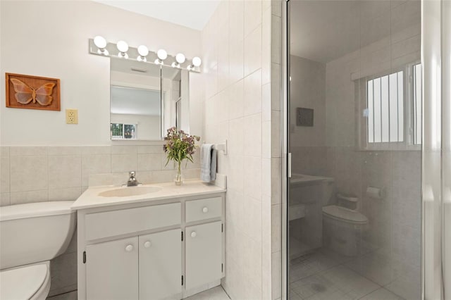 5800 3rd St S, Saint Petersburg, FL 33705 - full bathroom featuring tile walls, vanity, a shower stall, and tile patterned flooring