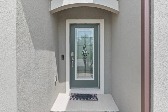 12653 Palapa Loop, Spring Hill, FL 34610 - entrance to property with stucco siding