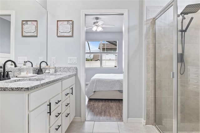 12653 Palapa Loop, Spring Hill, FL 34610 - bathroom featuring double vanity, a ceiling fan, ensuite bathroom, and a shower stall
