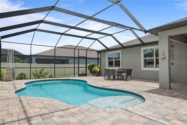 12653 Palapa Loop, Spring Hill, FL 34610 - view of pool featuring a patio area, a lanai, and outdoor dining area