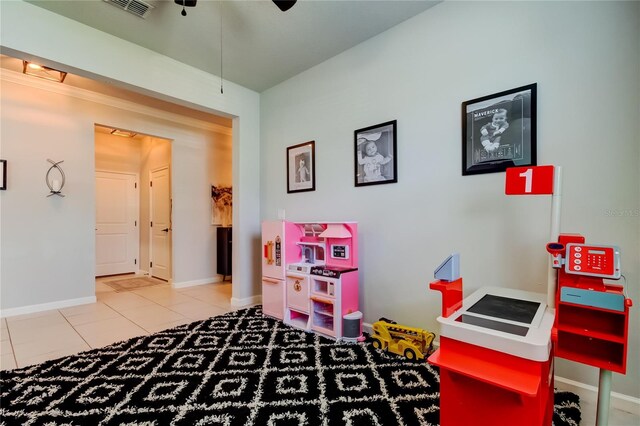 2456 Arbor Wind Dr, Lutz, FL 33558 - game room with a ceiling fan, tile patterned flooring, and baseboards