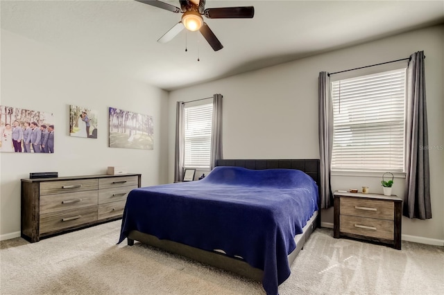 2456 Arbor Wind Dr, Lutz, FL 33558 - bedroom featuring light colored carpet, baseboards, and a ceiling fan