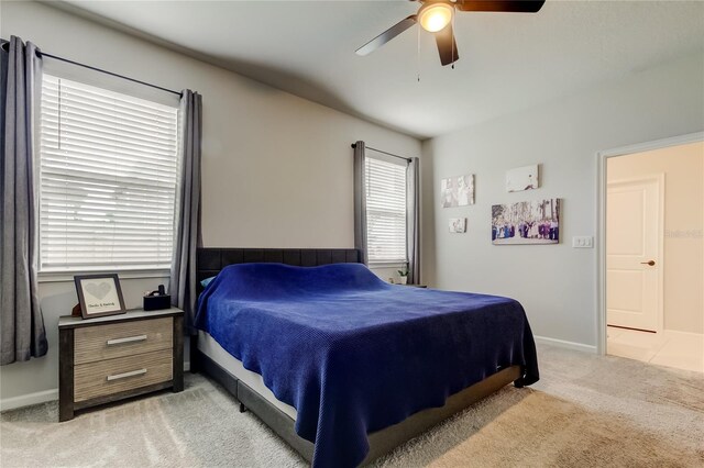 2456 Arbor Wind Dr, Lutz, FL 33558 - bedroom featuring light carpet, ceiling fan, and baseboards