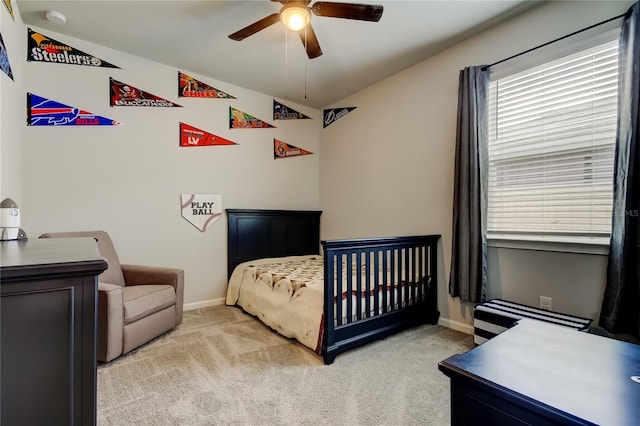 2456 Arbor Wind Dr, Lutz, FL 33558 - bedroom with multiple windows, baseboards, light colored carpet, and ceiling fan