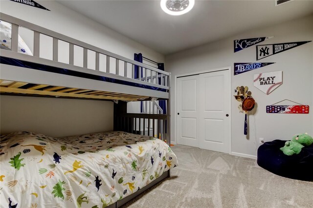 2456 Arbor Wind Dr, Lutz, FL 33558 - carpeted bedroom with a closet and baseboards