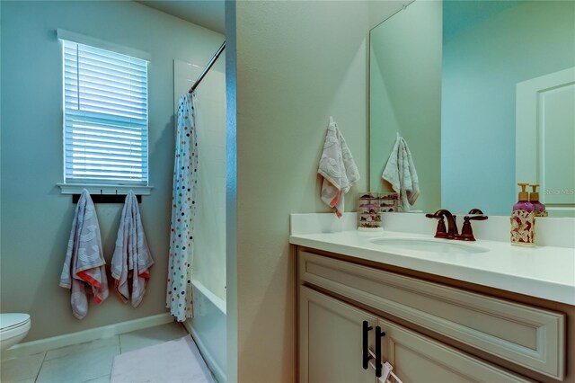 2456 Arbor Wind Dr, Lutz, FL 33558 - full bathroom featuring vanity, toilet, shower / bath combination with curtain, and tile patterned flooring