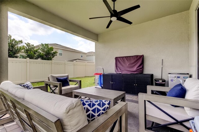 2456 Arbor Wind Dr, Lutz, FL 33558 - view of patio with an outdoor living space and a ceiling fan