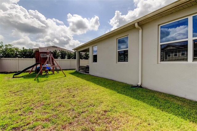 2456 Arbor Wind Dr, Lutz, FL 33558 - view of yard with a playground