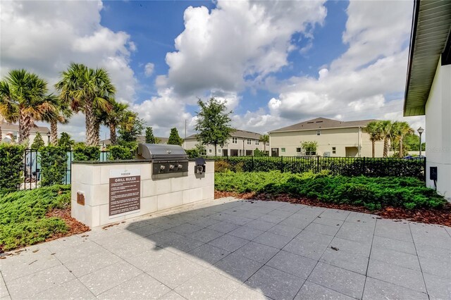 2456 Arbor Wind Dr, Lutz, FL 33558 - view of patio / terrace with a residential view
