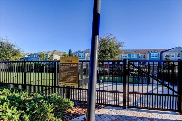 2456 Arbor Wind Dr, Lutz, FL 33558 - gate with a residential view