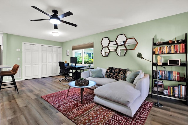 3229 40th Ln S Unit C, Saint Petersburg, FL 33711 - living area featuring ceiling fan, a desk, and wood finished floors