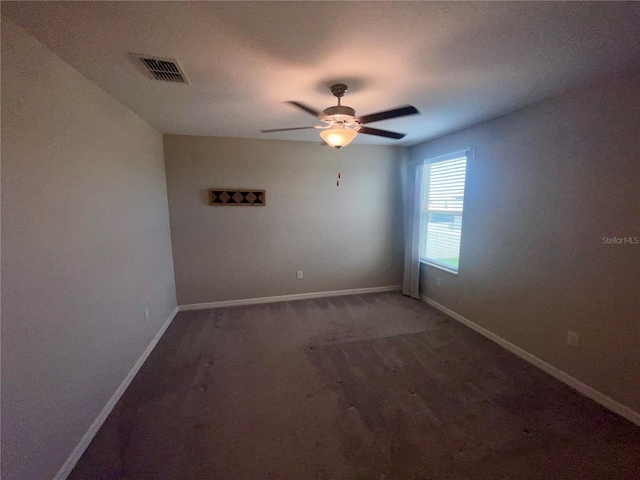 9520 Lemon Drop Loop, Sun City Center, FL 33573 - carpeted empty room with baseboards and a ceiling fan