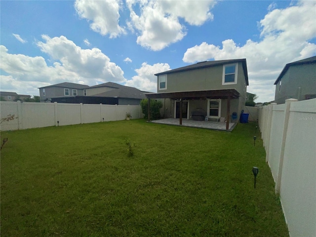 9520 Lemon Drop Loop, Sun City Center, FL 33573 - rear view of house with a patio and stucco siding