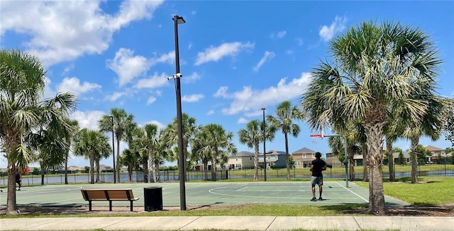 9520 Lemon Drop Loop, Sun City Center, FL 33573 - view of sport court featuring community basketball court, a water view, and a residential view