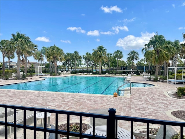 9520 Lemon Drop Loop, Sun City Center, FL 33573 - community pool featuring a patio