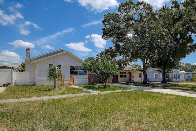 2627 17th Ave N, Saint Petersburg, FL 33713 - single story home with entry steps and a chimney