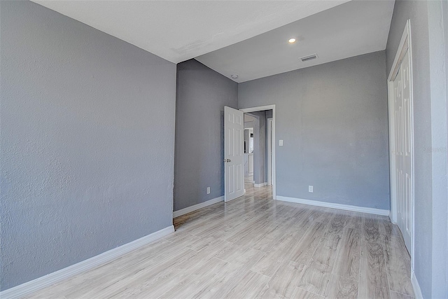 2627 17th Ave N, Saint Petersburg, FL 33713 - spare room with light wood-style floors and baseboards