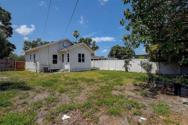 2627 17th Ave N, Saint Petersburg, FL 33713 - back of property featuring entry steps and central AC