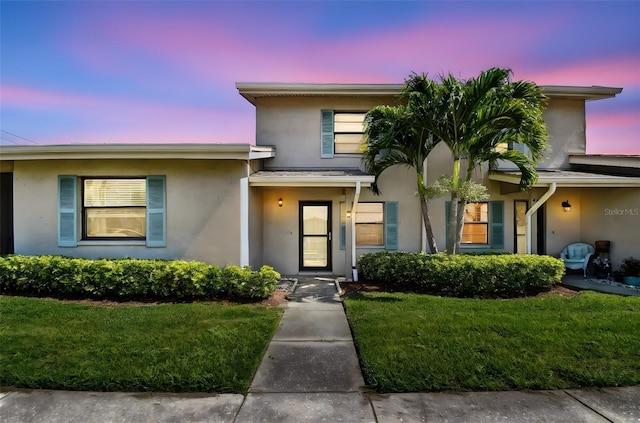 2131 Ridge Rd S Unit 3, Largo, FL 33778 - view of front of home featuring stucco siding and a yard
