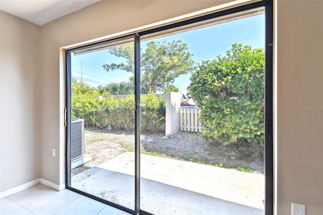 2131 Ridge Rd S Unit 3, Largo, FL 33778 - entryway with baseboards and light tile patterned flooring