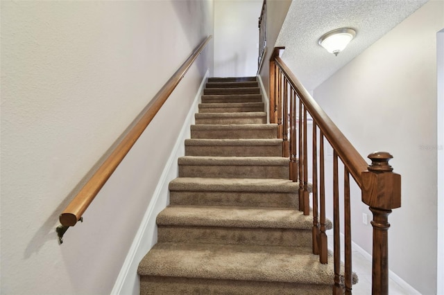 2131 Ridge Rd S Unit 3, Largo, FL 33778 - stairway with a textured ceiling