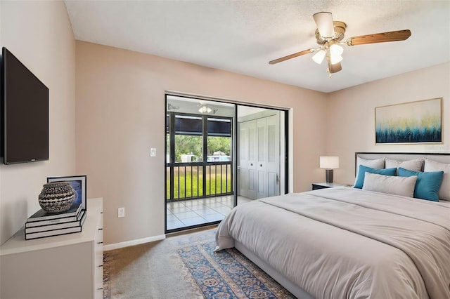 2131 Ridge Rd S Unit 3, Largo, FL 33778 - bedroom featuring access to exterior, carpet, baseboards, and ceiling fan