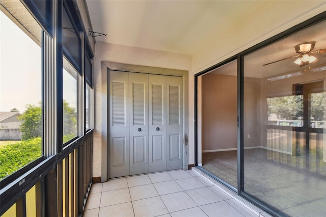 2131 Ridge Rd S Unit 3, Largo, FL 33778 - unfurnished sunroom featuring a ceiling fan