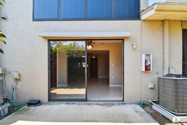 2131 Ridge Rd S Unit 3, Largo, FL 33778 - entrance to property with stucco siding and central AC